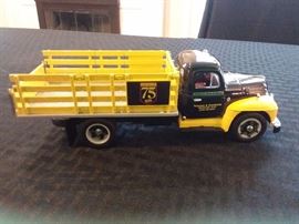 1:34 scale 1955 Diamond T Stake Truck. One new in box, one without box. 