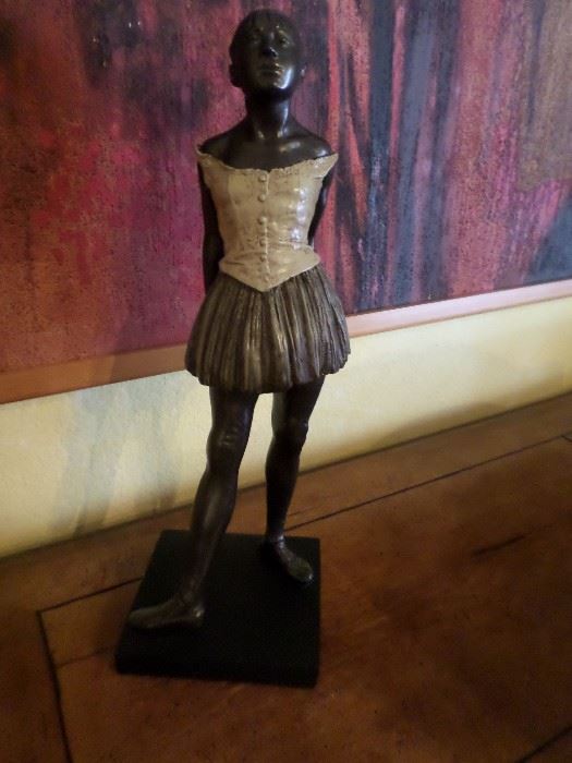 Young girl bronze statue