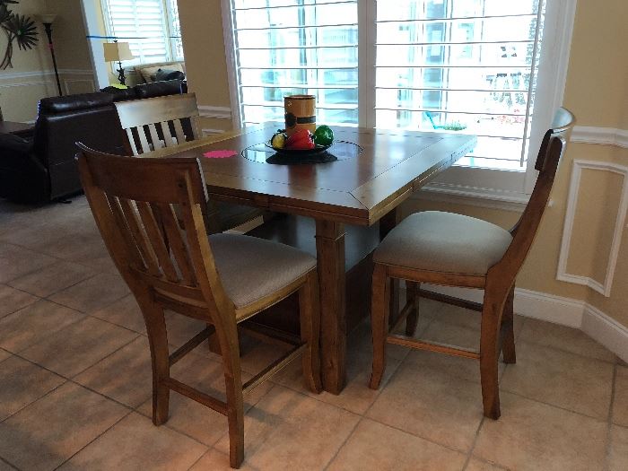 Bar style table with 4 chairs