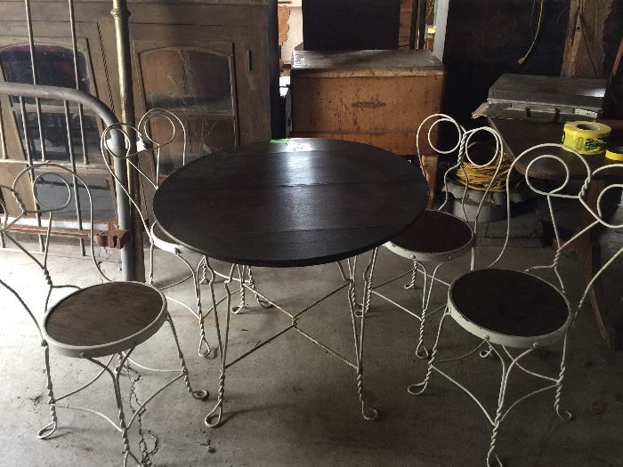 Ice cream parlor table with wedding rings chairs