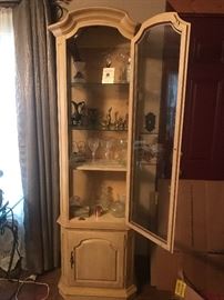 Very nice curio cabinet with light in top. 