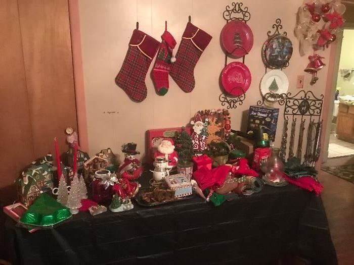 Many Christmas items - lights, plates, dishes, stockings, table runners and much more