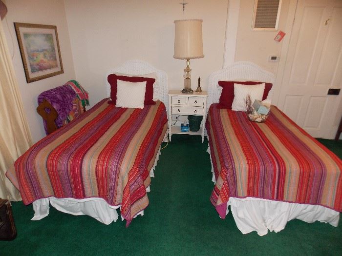 TWIN BEDS WITH WICKER HEADBOARDS