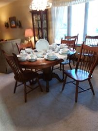 Wonderful Dining Table with chairs and set of china for service of 12