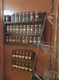 wood and glass bottle spice racks