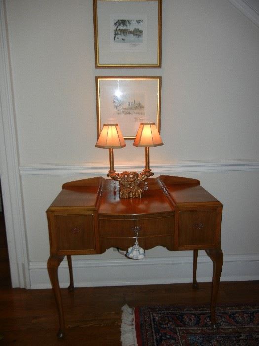 Gorgeous vanity, lamps and framed art