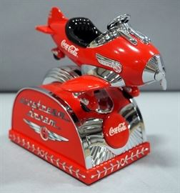 Enesco Coca-Cola Coke Airstream Dream Collectible Airplane Musical Bank, Plays "I'd Like to Buy the World A Coke"