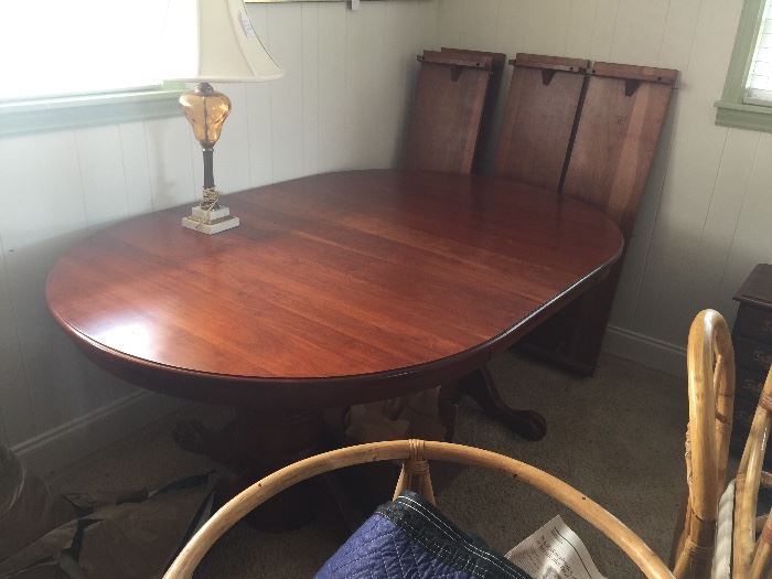 Made by Seely furniture. Beautiful cherry dining room table with 3 leaves...will seat up to 10-12 people.  