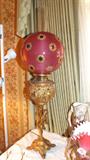 Bradley & Hubbard Figural Oil Lamp w/ Jeweled Cranberry Glass Shade.