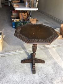 Carved wood occasional table