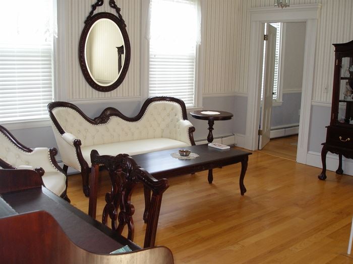 Setee, rectangular coffee table, curio, oval mirror