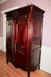 Large Mahogany carved armoire