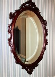two carved matching mirrors