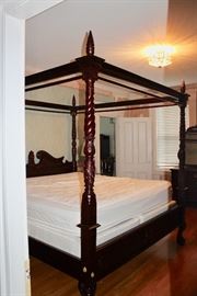 Mahogany carved 4-poster bed with canopy.  Separate Daly Bros. king mattress and box springs.