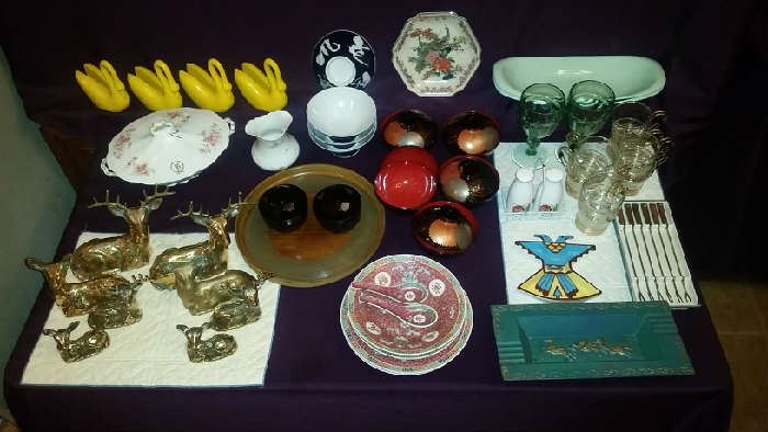 A sampling: Asian & English dishware, brass  figures and trays, glassware , National Parks souvenir,  fondue forks