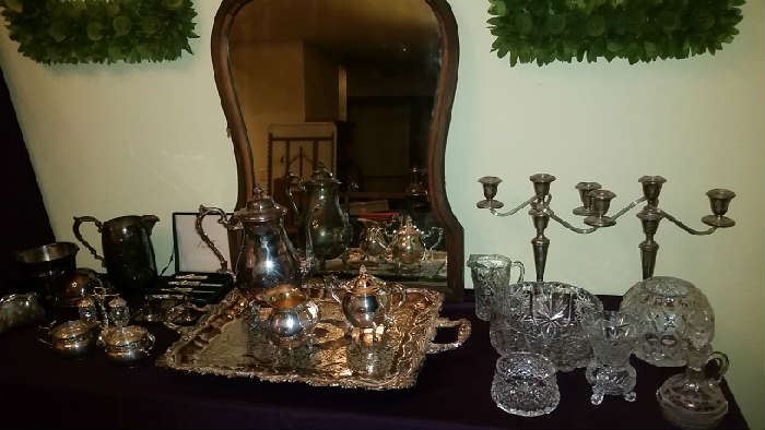 Silverplate, cut glassware and cut crystal, antique mirror, shaped wood square wreaths
