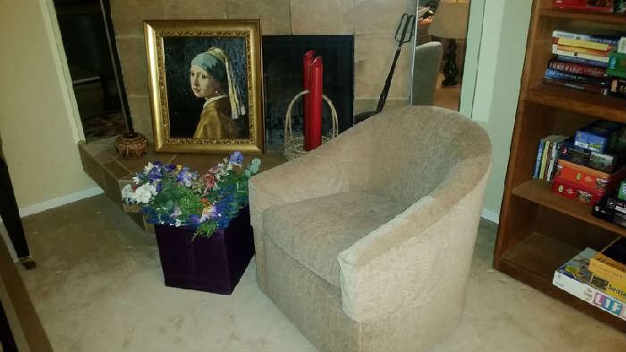 Like new Selden custom swivel chair, framed "Girl with the Pearl Earring," Peruvian carved gourd, large candles, basket and fireplace tool