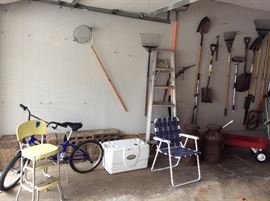 Boys bike, cooler,ladder , step chair, and decorative brick & stone