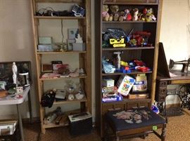 Toys, partylite,bookshelf and piano bench