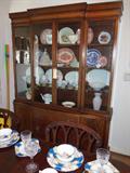 Beautiful 1940's china cabinet with china pieces.