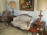 Exquisite Victorian setee with vintage Rembrandt lamps.