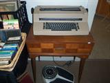 Great IBM Selectric typewriter on 1950's sewing machine case.