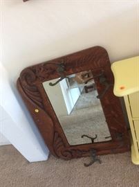 Antique mirror with hooks