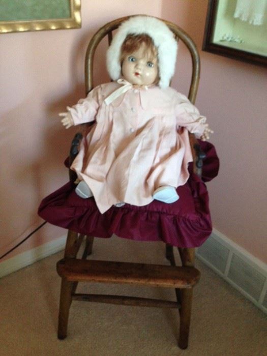 doll in chair