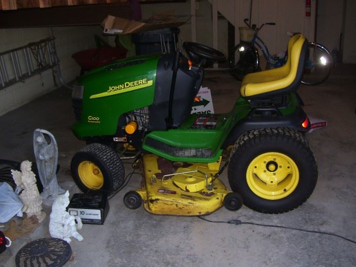 G100 automatic lawn tractor with 54" mower pan.