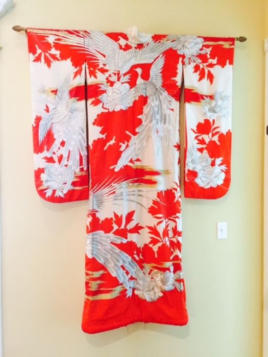 Silk kimono with puffy silver embroidery.
