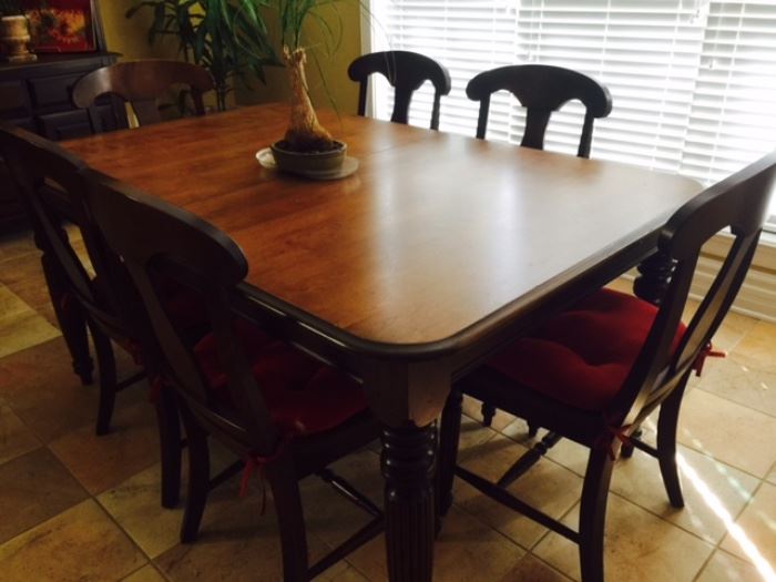 walnut dining table with 1 leaf and dining chairs