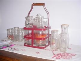 Milk, cream, and other bottles and carrier