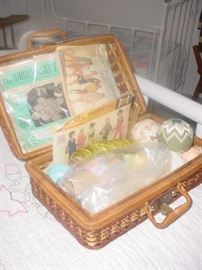 Old sewing basket with collectible sewing items