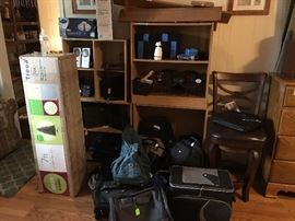 Cubicle shelving, bar stool, Christmas tree, luggage, Bose speakers, lighting,
