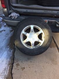 4- 2002 GMC 17 inch Denali Rims w/ very used tires  size:265/70/R17