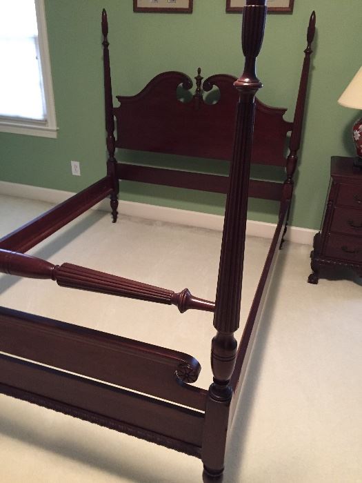Full size mahogany bed frame. Measures about:  56" wide, 61" high, 80" long