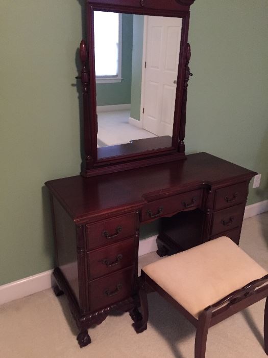 Mahogany vanity - mirror and bench.  Measures about 30" high,  17" deep, 46" wide.