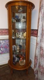 round glass and wood curio cabinet