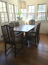 English pub table with expanding leaves and six chairs. 