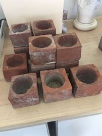 Bought these ceramic containers in Sausalito California to use for succulents. My dad (Navy vet) figured out what they are! They're "holy stones" used to clean decks of ships.. with all the old shipyards in area it makes sense! 