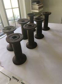 Old iron seed spacers... make wonderful candle holders with pillar candles on top!