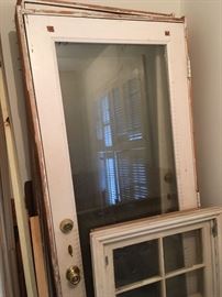 two double pained glass french doors with door frame  32" x 80"