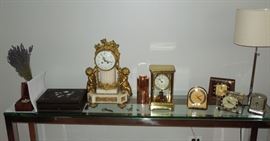 Selection of circa 1920-50 American electric clocks, rare torsion pendulum brass cased 400-day clock with fired enamel dial.
