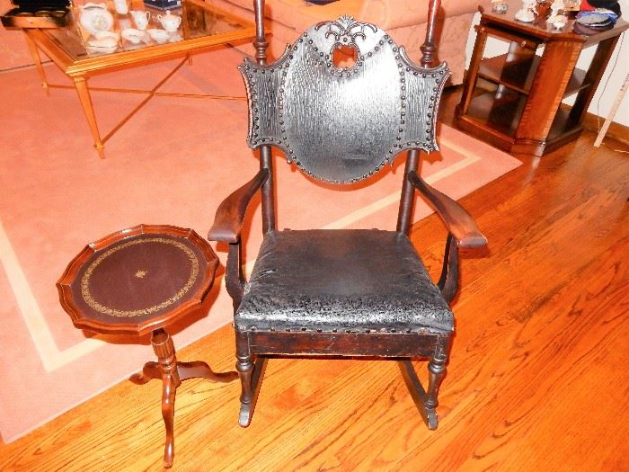 This incredible Leather and wood rocker is a true beauty and a lovely antique for your home, let's not forget to mix the antiques with the modern for a true showcase home