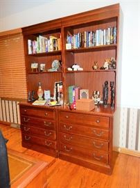 Executive Deak, 3 vintage typewriters, and a pair of book/storage shelving units.