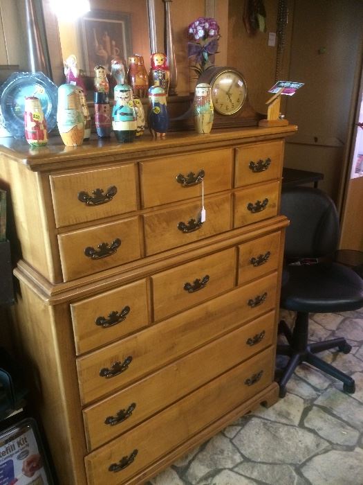Traditional tall dresser with Russian stacking dolls