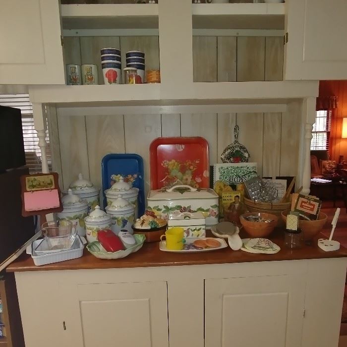 A kitchen full of vintage goodies glassware Tupperware vintage pots and pans