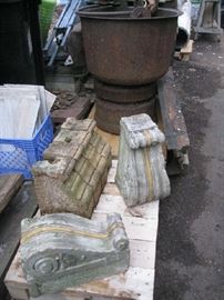 Cement and Terra Cotta Corbels and Cast Iron Cauldron