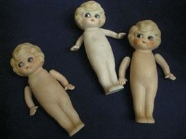 Kewpie Style Porcelain Dolls - at least a dozen