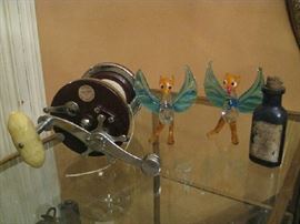 Murano Glass owls, old fishing reel  (also have old fishing rod), blue poison bottle